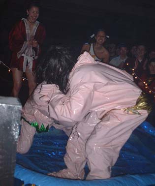 Oil Wrestling Match - Two "ladies" battle it out in baby oil. The Madagascar Institute's "The Festival of the Hurting" party, Brooklyn, NY.