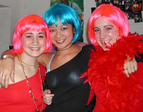 Orthodox women wear wigs.  Beacuse its a "Burn" Mitzvah--- Colored wigs are encouraged!
