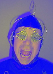 zorlon screams - cammander zorlon seen here wearing  brooks coleman's perfshades #2001 which sell for about $40.he's also wearing the matching mind control protection head set.more on zorlon (A.K.A. fred mitchim) at:fredmitchim.com
more on brooks at: ...