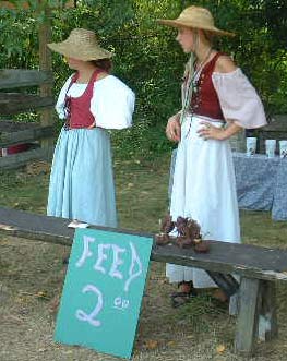 Feed Girls... - ...at the petting zoo.  NY Renaissance Faire at Sterling Forest, Tuxedo NY, 2001