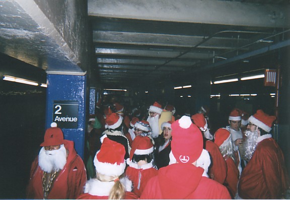 No force on earth can stop 100 Santas... except the MTA - NYC SantaCon 2001