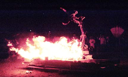 Subjucator Burns Elvis - Burning Man 2001. To edit, email editor@costumenetwork.com
