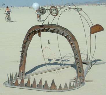 Sharp Toothed Fish - One of the many great playa obstacles you can crash into at night... Burning Man 2002