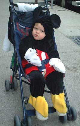 Mickey-Baby - Where's the smile, kid?  Just outside the ABC Regis & Kelly Halloween Show,2001. More Pics in the Halloween-NYC section.