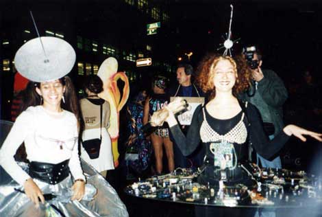 Beautiful Satellites - Carefree Costumers using fabric, plastic and pasted-on electronic tidbits.  Both had red flashing "nipple-lights".  New York City Halloween Parade.