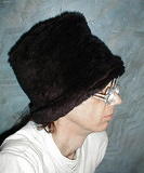 fuzzy stovepipe head - this is me in one of my warmest hats made from faux fur inside and out.I make them for about$20.
e-mail me:brooksdesign@mail.gbronline.com