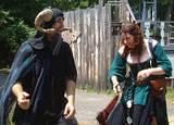 Bad, Naughty Tim - Monty Python's Tim the Enchanter getting a sound spanking from a saucy lass at the NY RenFaire in Tuxedo, NY.  2001