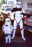 Stormtrooper Recruit - Lord Vadar wants them to be recruited young for the Empire!  Here a new "Sith" recruit tries on his armor along side Trooper "Oberon" TK124, 501st, Garrison Carida.  To join with TK124 in the defense of the Empire go to www.501st...