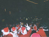 Commuter Santas at Grand Central - NYC SantaCon 2001