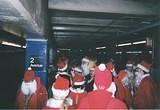 No force on earth can stop 100 Santas... except the MTA - NYC SantaCon 2001