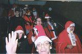 Santas on the move - NYC SantaCon 2001