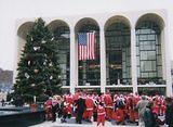 Worrying the guards at Lincoln Center - NYC SantaCon 2001