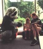 Rocky Racoon Reading - Rocky with a little 'un and her Mom