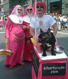 Albert Crudo - Visit AlbertCrudo.com or go to hell!  (the sign says)... NYC Gay Pride Parade, 6-30-02