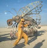 Iron Butterfly & Artist - After the Caterpillar shell was burned off... Burning Man 2001.  To edit, e-mail Editor@CostumeNetwork.com