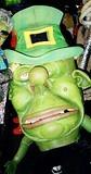 Giant Evil Leprechuan Head - Costumer looks out the hat/window.  2000 NYC Halloween Parade